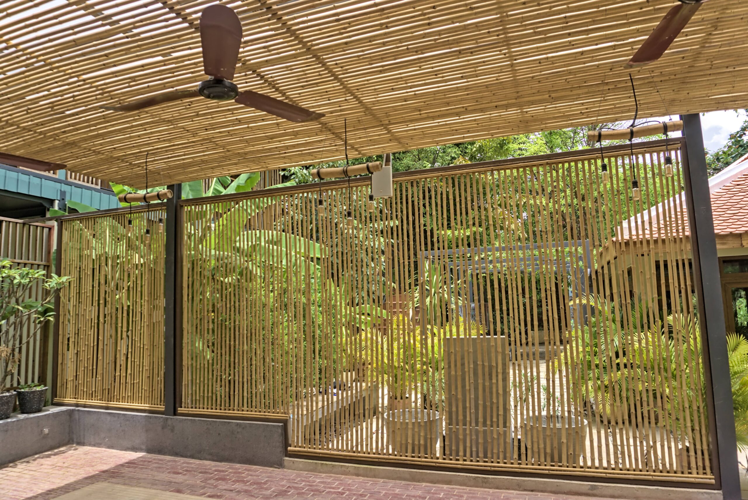 The photo of wall and ceiling made of bamboo vertical poles
